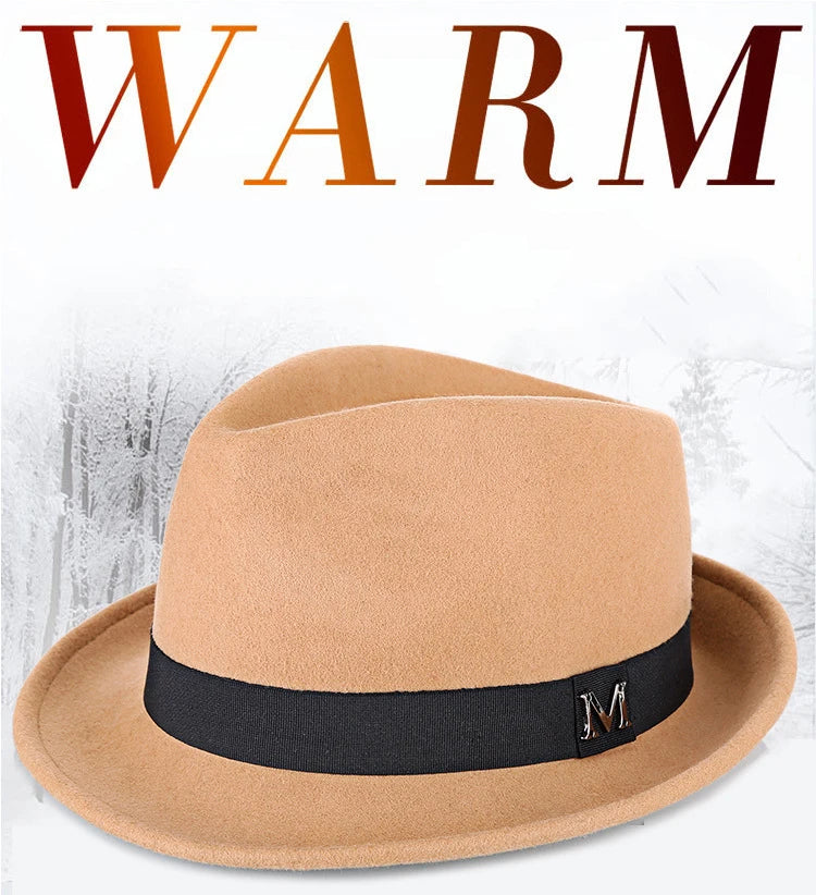 Tan wool felt fedora hat for men, featuring a black ribbon band with a decorative metal 'M' emblem.