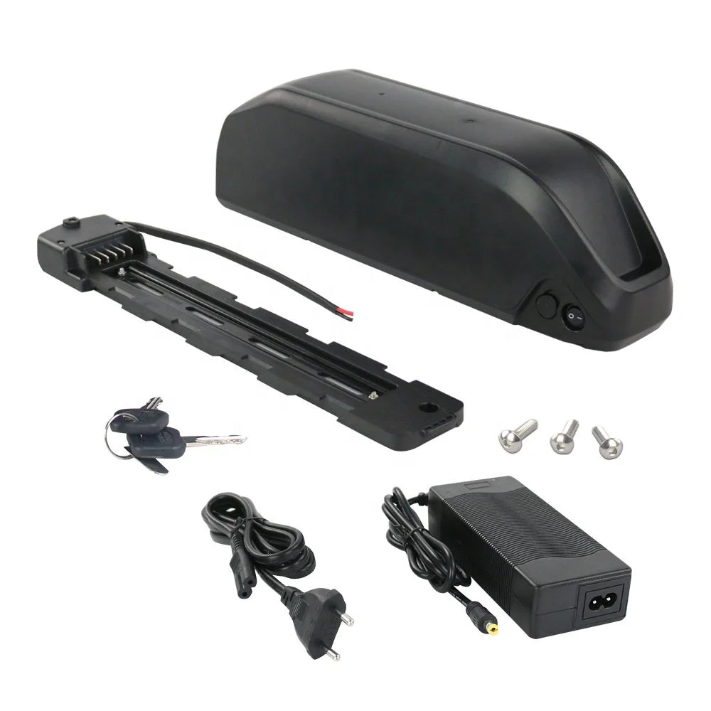 Black e-bike battery kit with mounting rail, keys, power adapter, and fixing screws, isolated on a white background.