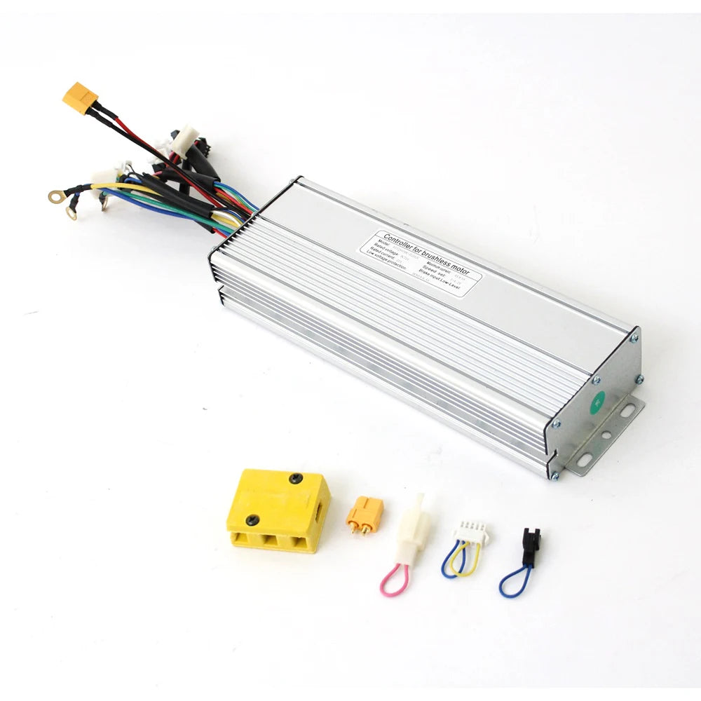 Silver rectangular brushless motor controller with attached multicolored wires and connectors, plus loose parts.