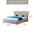 Luxury cream genuine leather double bed with a button-tufted, winged headboard and modern low-profile frame.