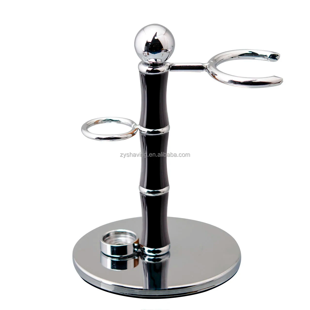 Luxury chrome and black shaving stand with holder for a razor and brush on a circular polished base.