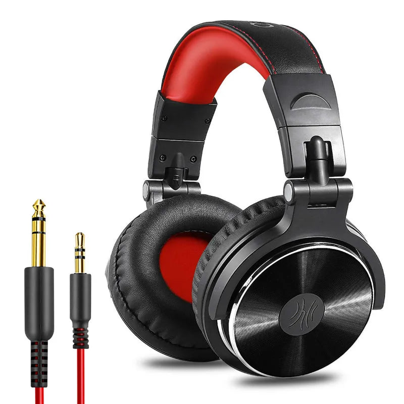 Black and red wired over-ear studio monitor headphones with cushioned headband and a 6.35mm audio adapter.
