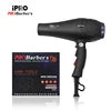 Professional black 2600W salon hair dryer with an ergonomic handle and hanging loop, presented with its product box.