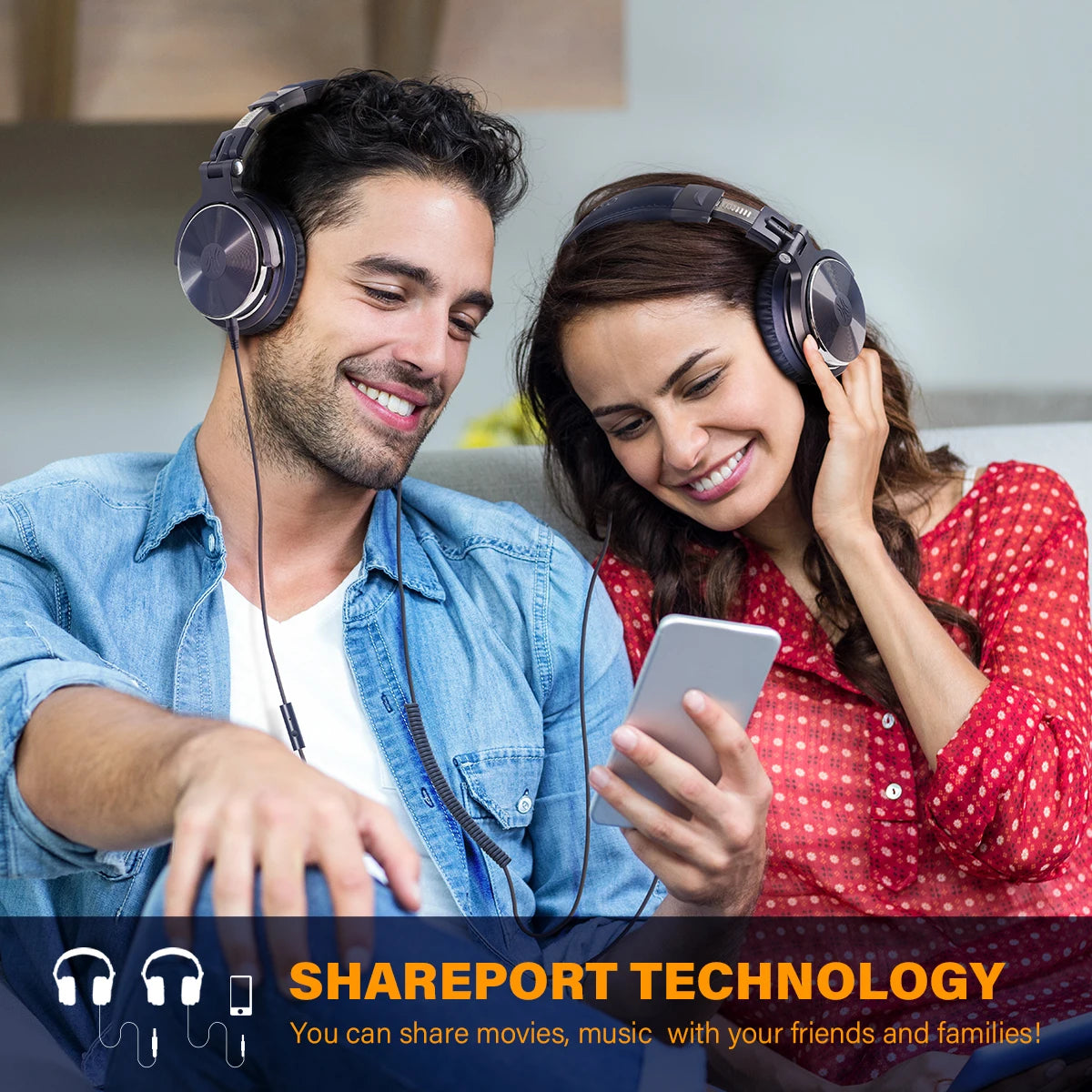 A man and woman smiling while wearing sleek, dark grey wired DJ studio headphones with built-in microphones.