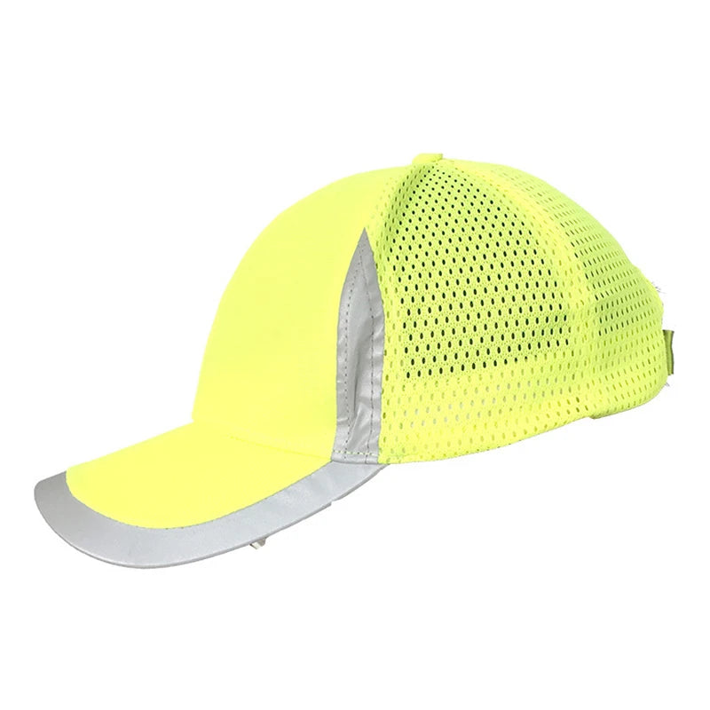 High-visibility neon yellow baseball cap with breathable mesh panels and silver reflective detailing on the peak and side.