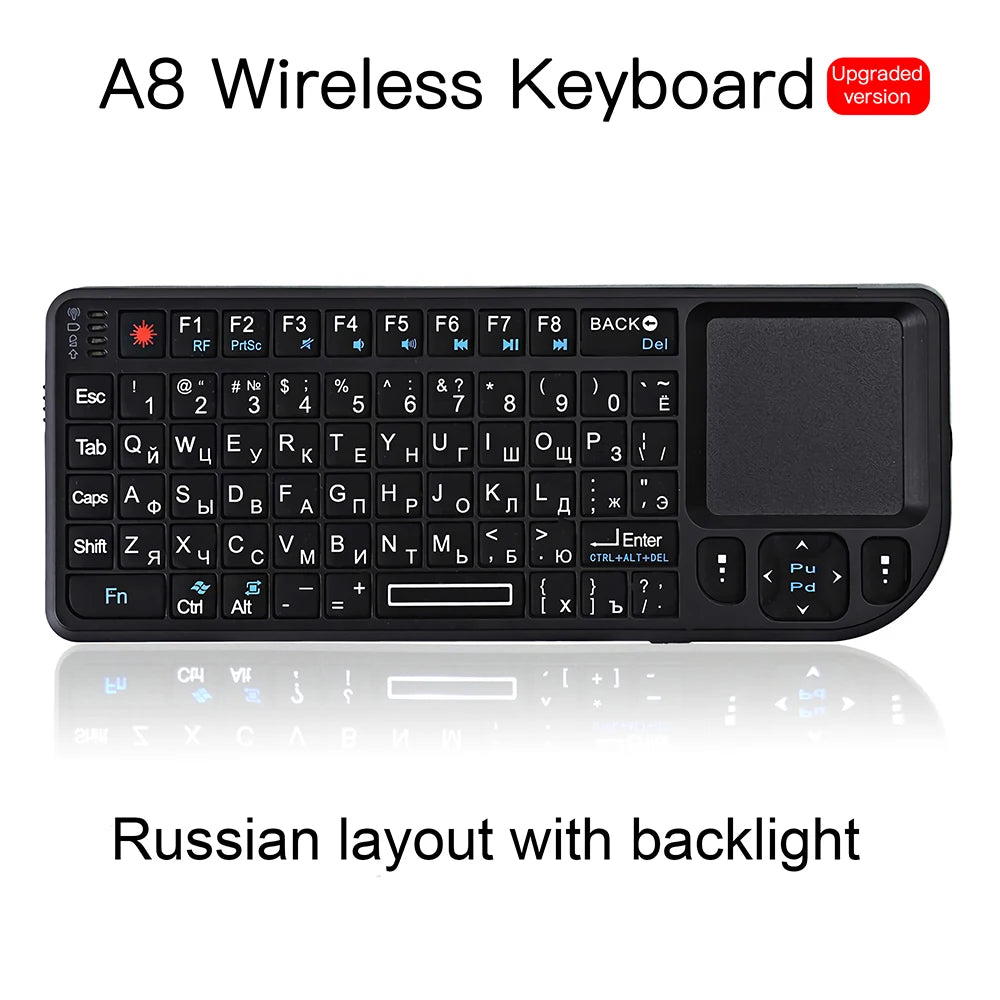 Black plastic wireless mini keyboard with Russian layout, integrated touchpad, and function keys on white background.