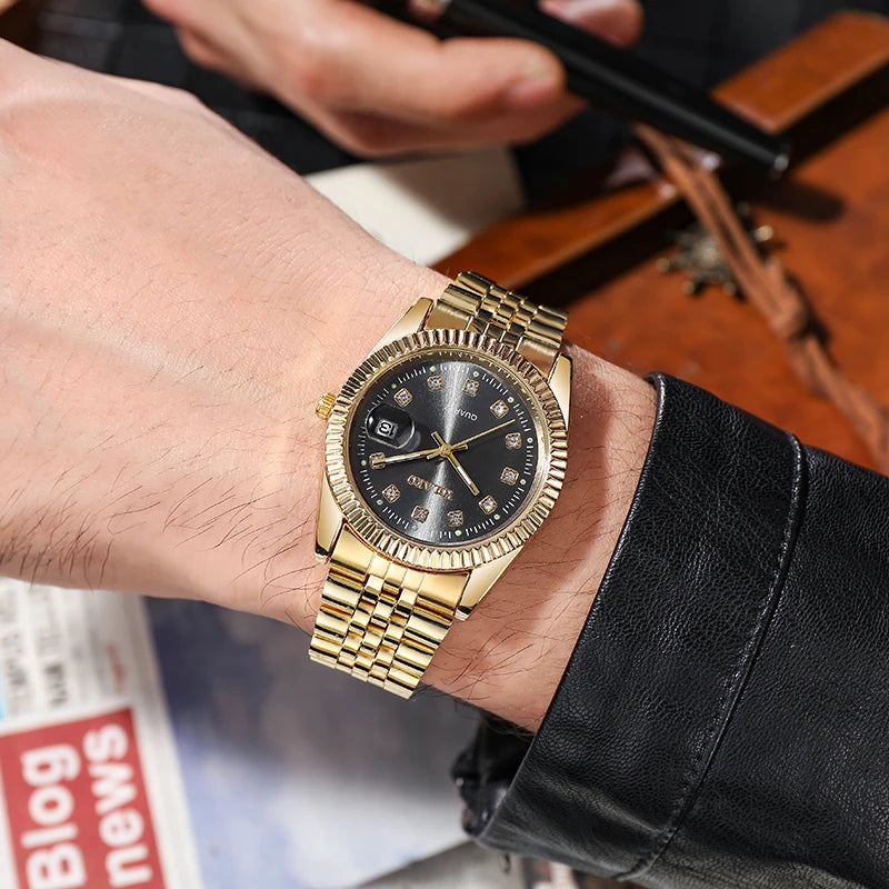 Men’s luxury gold-tone quartz watch with a black dial, crystal hour markers, date window, and a link bracelet.