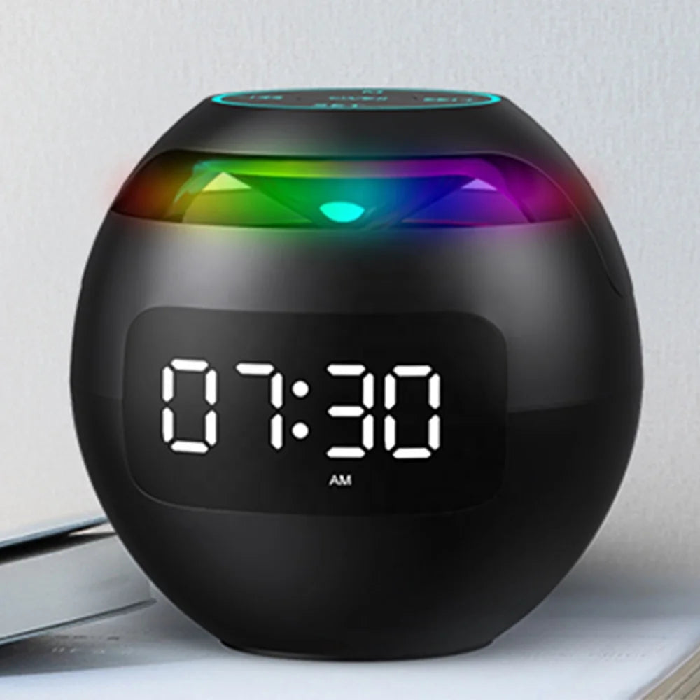 Black spherical Bluetooth speaker with a digital alarm clock display and vibrant, multicoloured LED light accents.