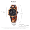 BOBO BIRD wooden watch with round brown bezel, black face, day-date display, and multi-colored wooden link strap.