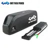 Black e-bike battery pack with separate mounting plate and integrated power cables on a white background.