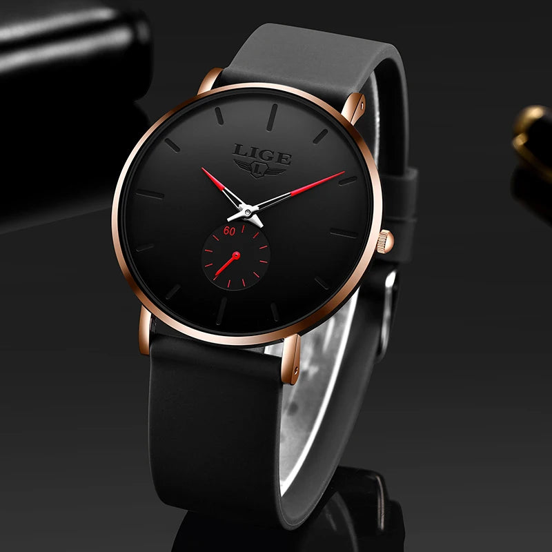 LIGE quartz watch with round black dial, rose gold case, red accents, and black silicone strap.