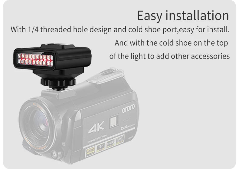 Black rectangular plastic infrared LED light mounted on a 4K video camera with a top cold shoe mount.