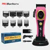 Pink professional electric hair clippers with charging stand, eight guide combs, cleaning brush, and power cable.