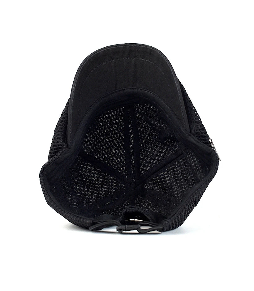 Inside view of a black unisex flat cap, featuring a lightweight, breathable mesh construction and adjustable back strap.
