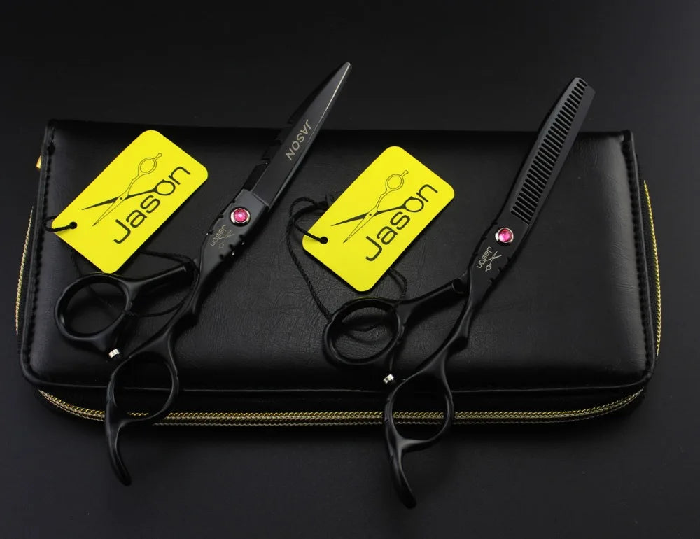 A pair of professional 5.5-inch black salon hairdressing scissors and thinning shears with pink jewelled screws.