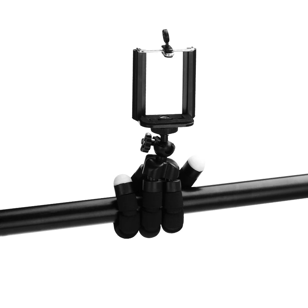 Black flexible tripod with a smartphone mount, wrapped securely around a horizontal black bar.