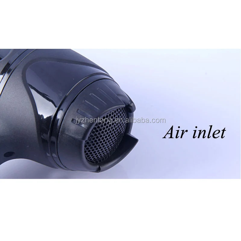 Close-up of a sleek, black professional hair dryer, highlighting the ventilated air inlet design.
