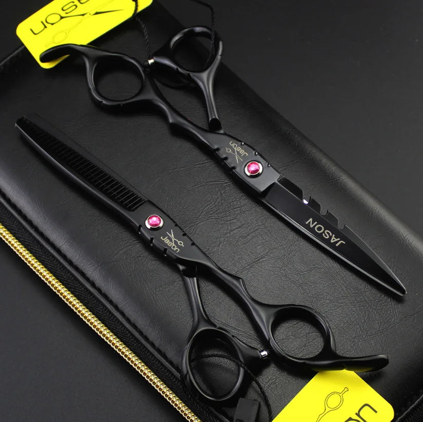 Professional 5.5-inch black salon hairdressing scissors and thinning shears with decorative pink jewel accents.