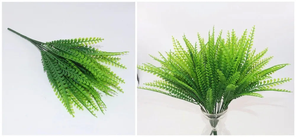 A bunch of artificial bright green fern stems shown flat and arranged in a glass vase against a white background.