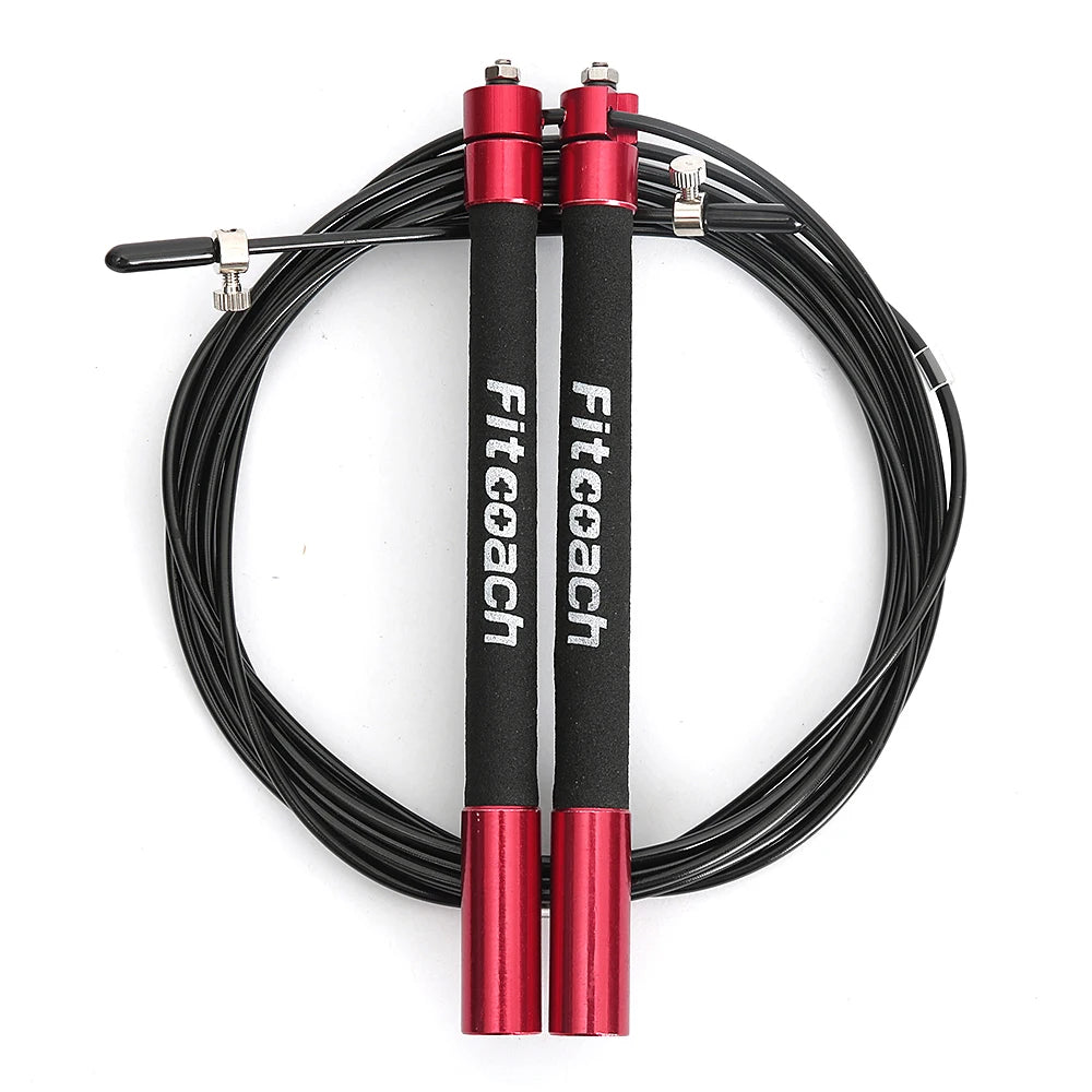 Black speed jump rope coiled with red and black metal handles featuring white brand text.