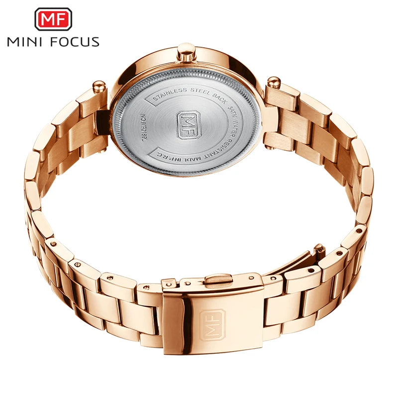 Mini Focus rose gold stainless steel women's quartz watch, showing back case and link strap.
