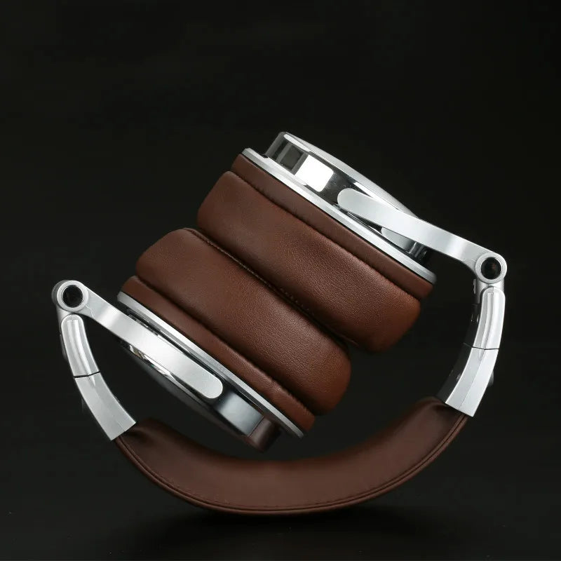 Foldable over-ear studio headphones in brown faux leather with polished silver metal accents on a black background.