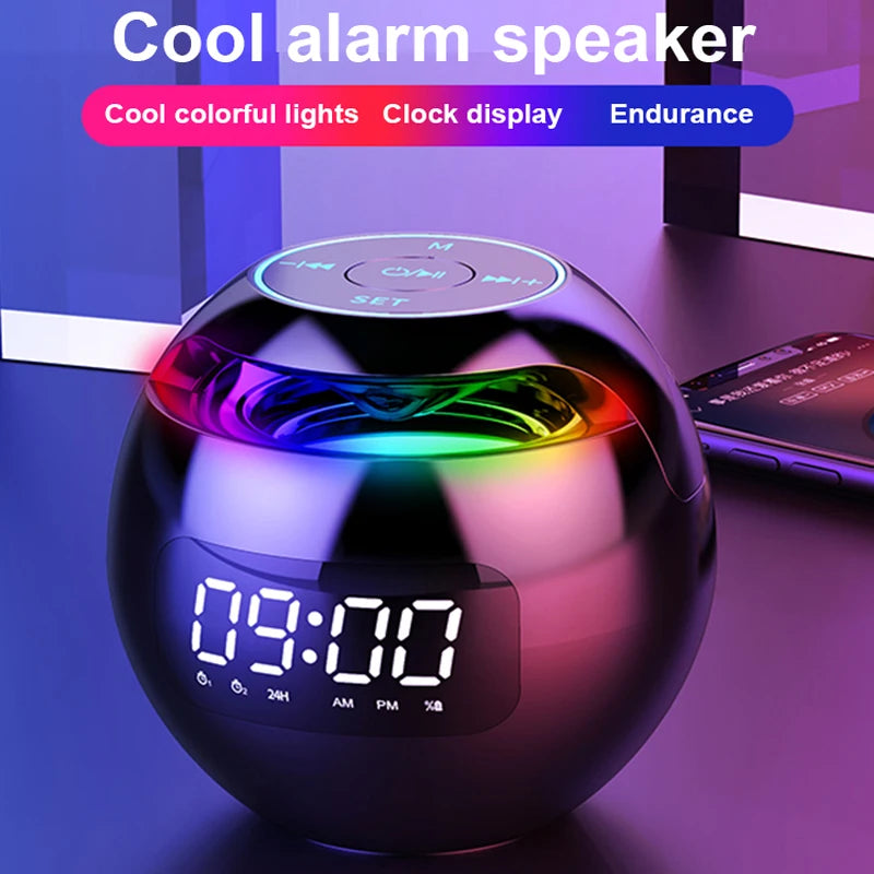 A round, black Bluetooth speaker and LED alarm clock with colourful ambient lighting and a digital time display.