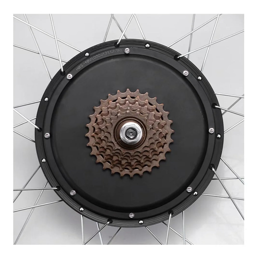 Black electric bike hub motor wheel with a multi-speed brown cassette gear cluster and silver spokes.