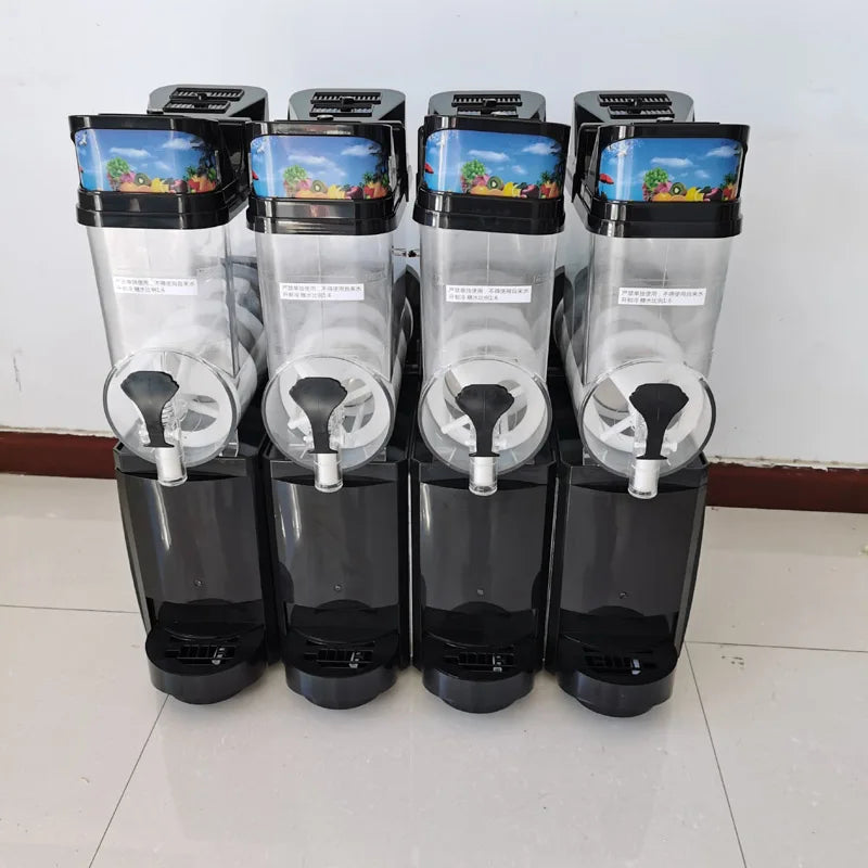 Commercial slush machine with four clear 15L bowls, black base, and individual dispensing taps.