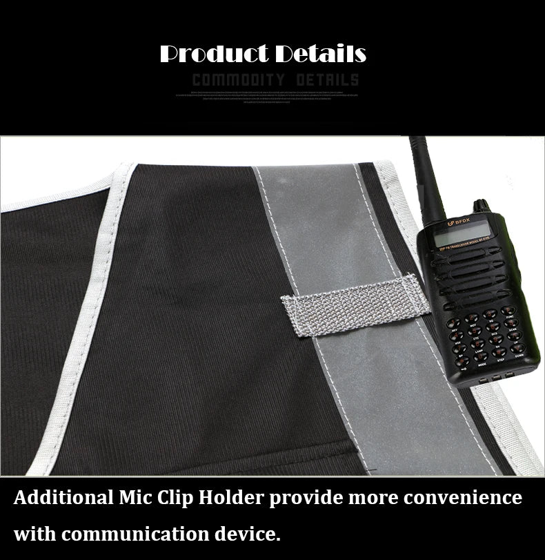 Black hi-vis safety vest detail featuring a reflective strip and a secure clip for a two-way radio.