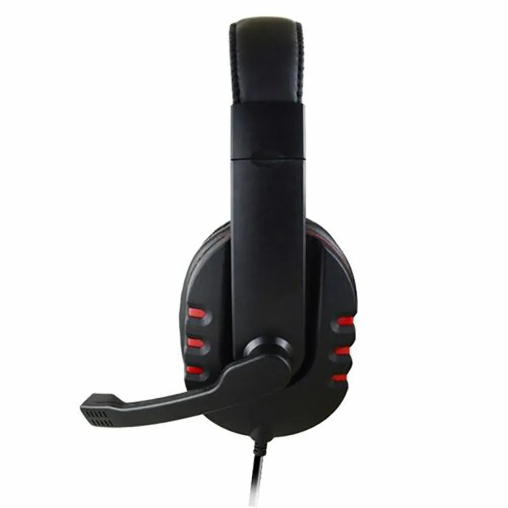 Black wired gaming headset with padded headband, over-ear cups, red side accents and an integrated microphone.