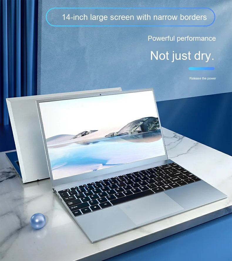 Silver 14-inch laptop with a slim-bezel Full HD screen and black keyboard, set on a marble-style desk.