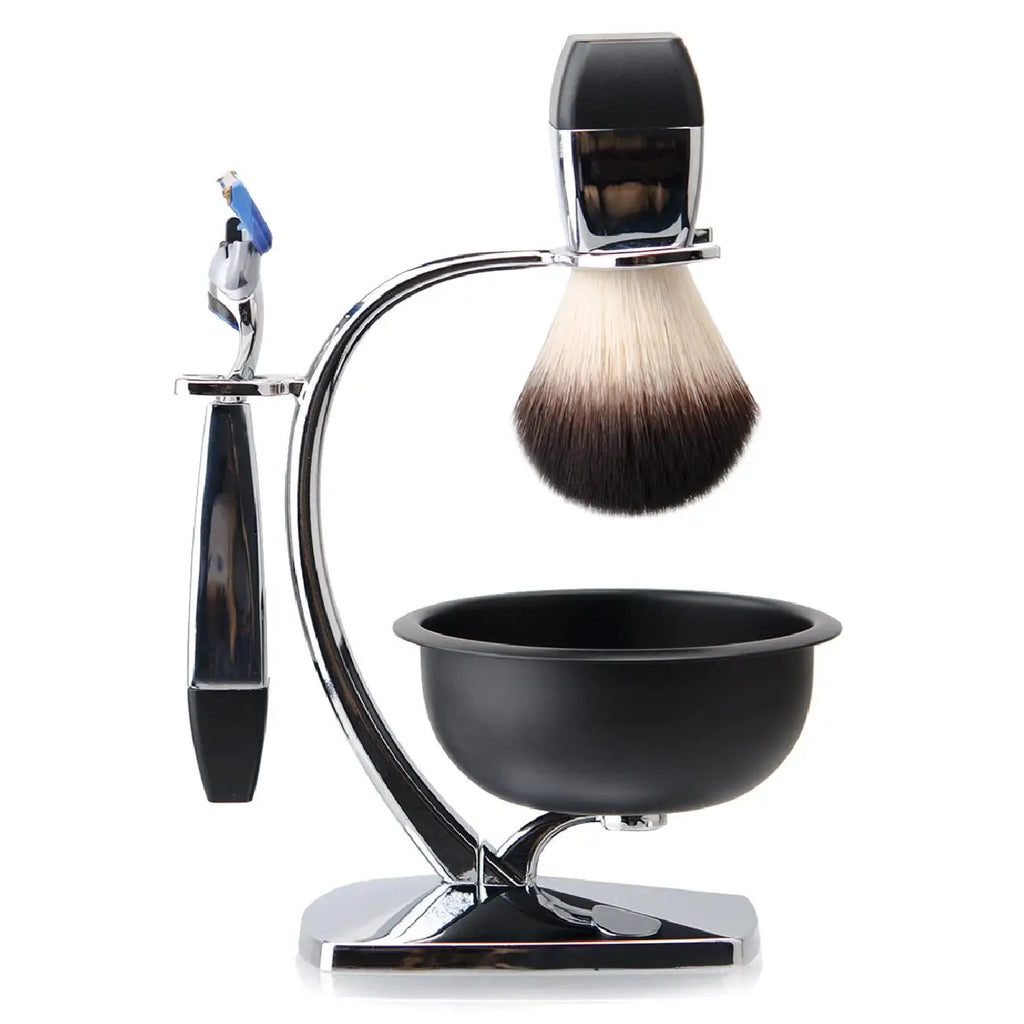 Chrome and black men's shaving set including a razor, brush, stand, and bowl on a white background.