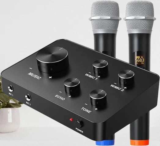 Wireless karaoke set featuring two black handheld microphones and a compact black audio mixer with rotary controls.
