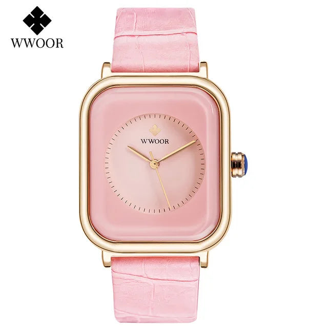 Ladies' square watch featuring a pastel pink dial, gold-tone case, and textured pink leather strap.