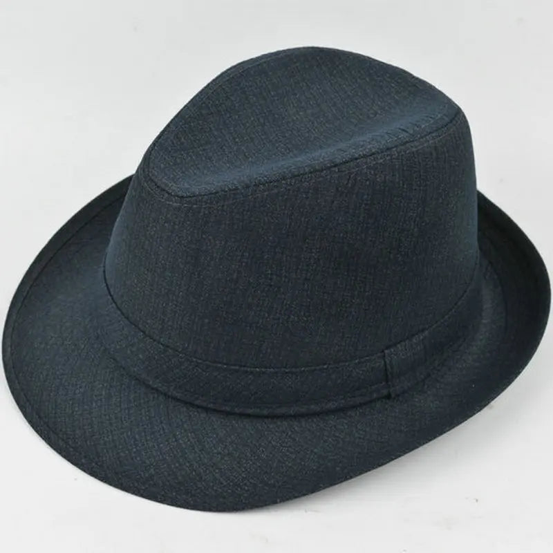 A classic dark navy blue felt fedora hat with a structured brim and subtle textured finish.