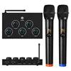 Two black wireless microphones with coloured bases next to a compact audio mixer console with five control dials.