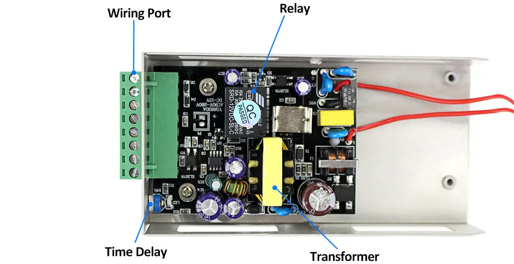 Electronic circuit board with a relay, yellow transformer, and green terminal block inside a metal casing.