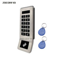 Silver metal access control keypad with card reader and two blue RFID key fobs.