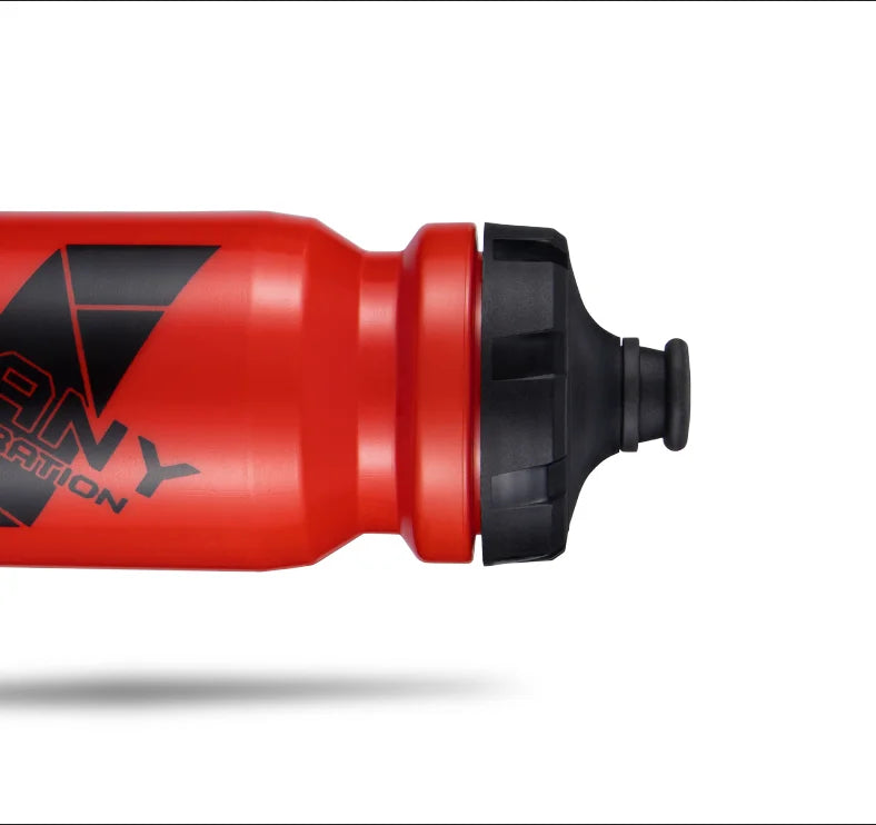 Bright red sports water bottle with a black pull-top cap and partial black branding against a white background.