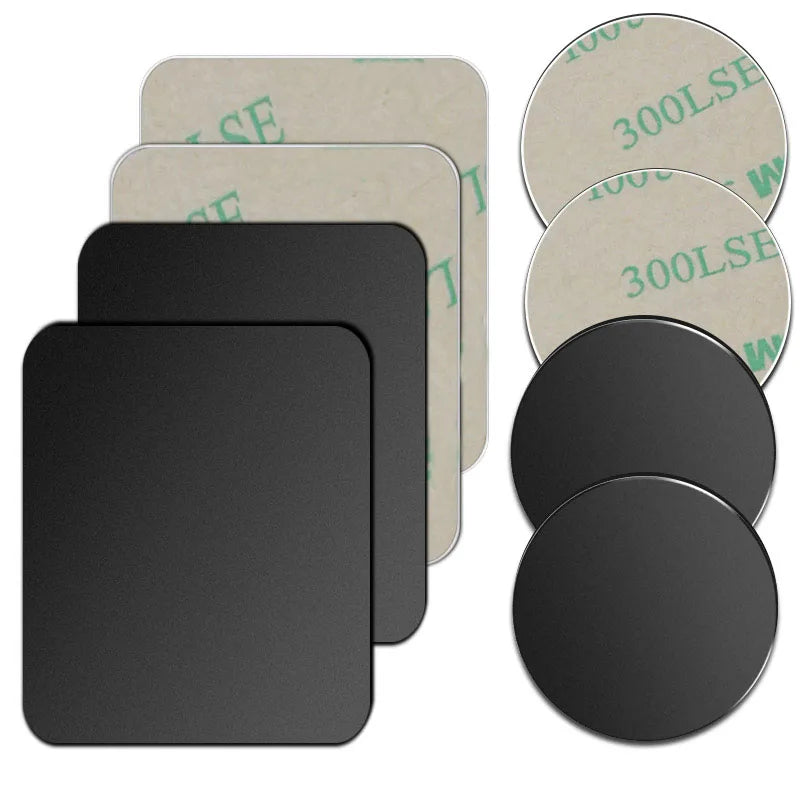 Assorted black rectangular and circular adhesive pads with peel-off backing, showing both adhesive sides.