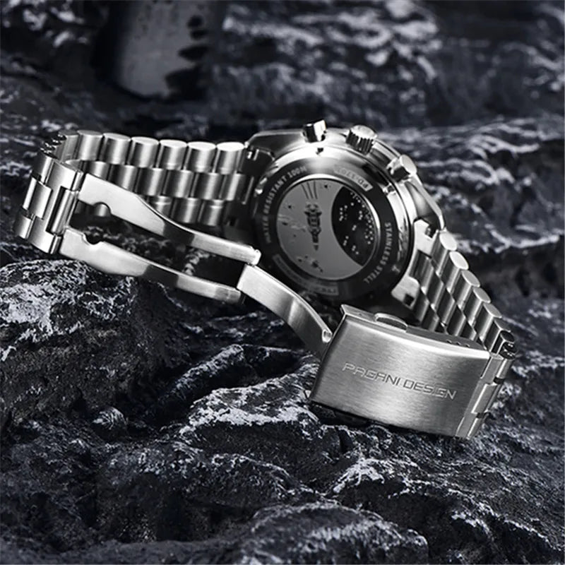 Silver Pagani Design men's chronograph watch with a metal link bracelet, open clasp, and engraved case back.