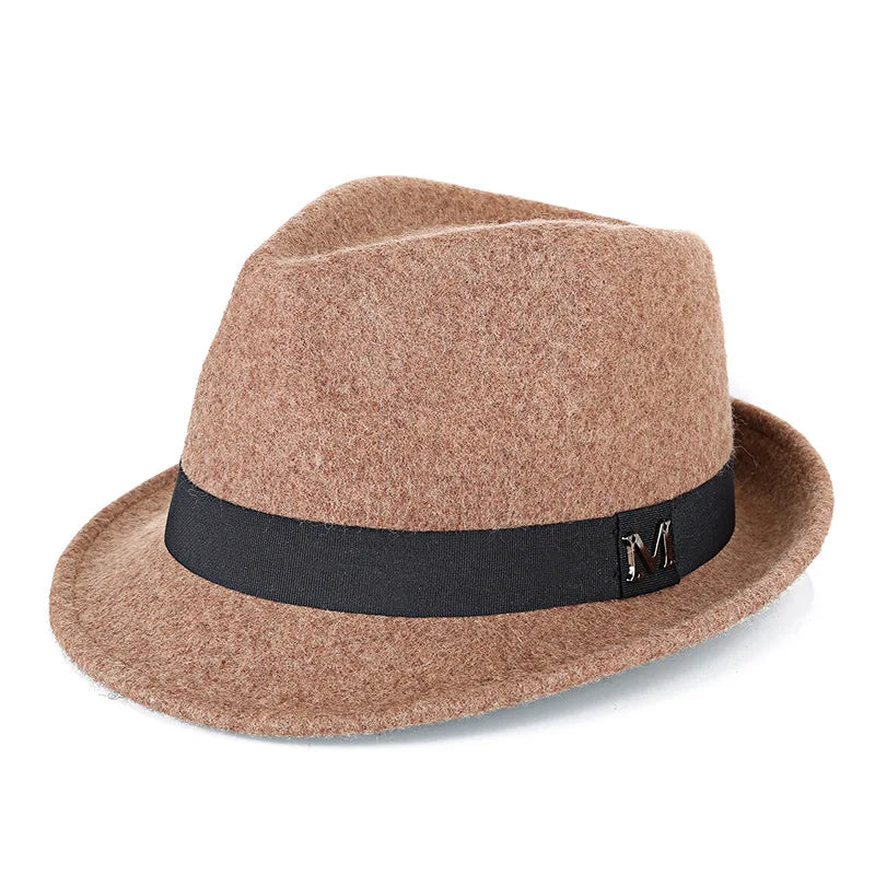 Camel-coloured men's wool felt fedora with a black grosgrain ribbon band and a metal letter 'M' detail.