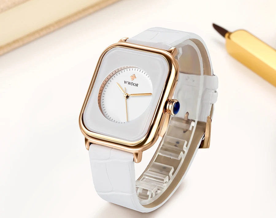 Elegant ladies' square watch with a white dial, gold-tone case, and white croc-effect leather strap.