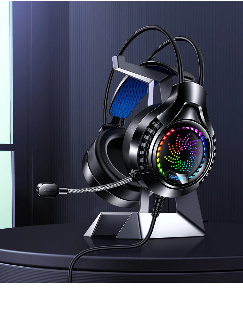 Black gaming headset on a stand, featuring rainbow RGB lighting, a flexible boom microphone, and blue padded headband.