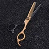 Professional 6-inch hairdressing thinning scissors in a gold and black finish on a textured black background.