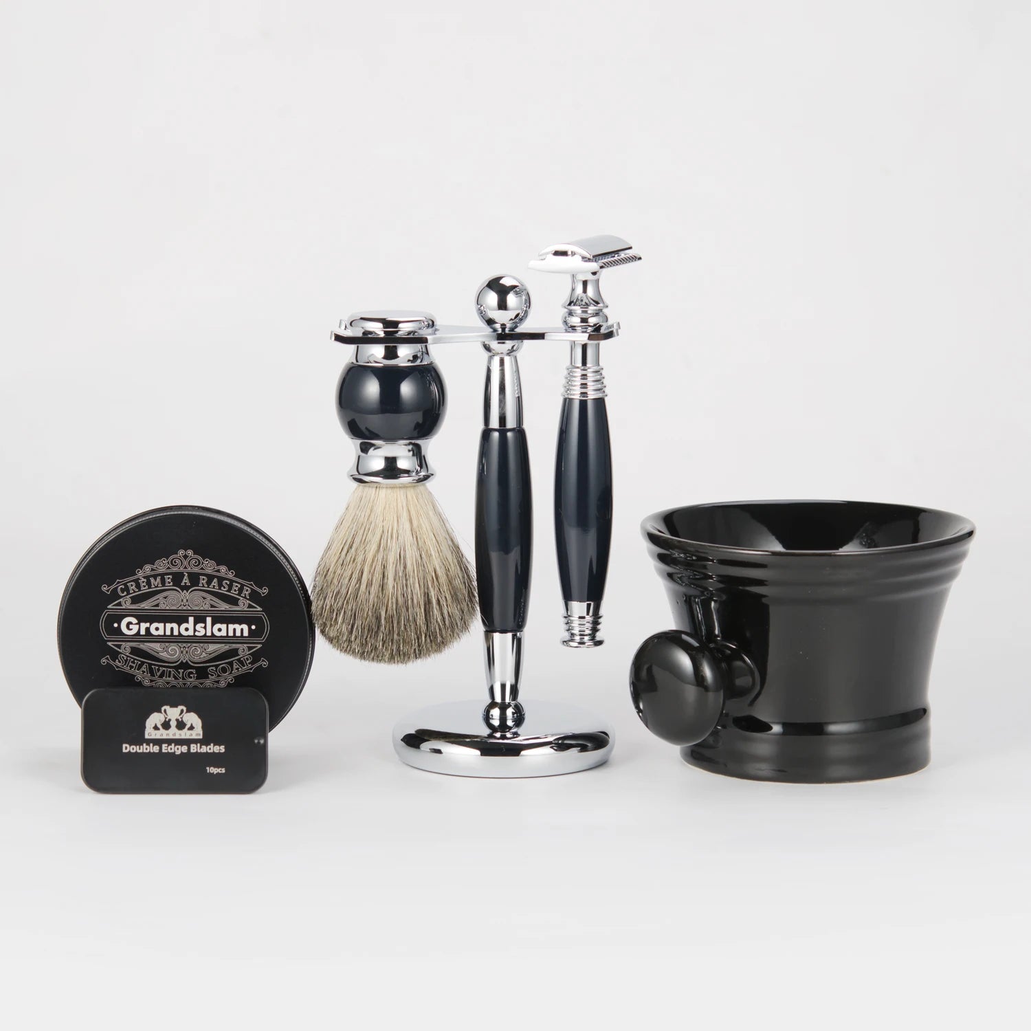 Classic safety razor and badger hair shaving brush set on a chrome stand, with black shaving soap and a ceramic bowl.