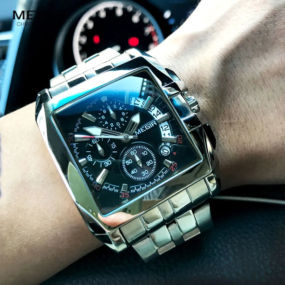 Men’s square-faced stainless steel quartz watch with a black chronograph dial and linked metal bracelet.