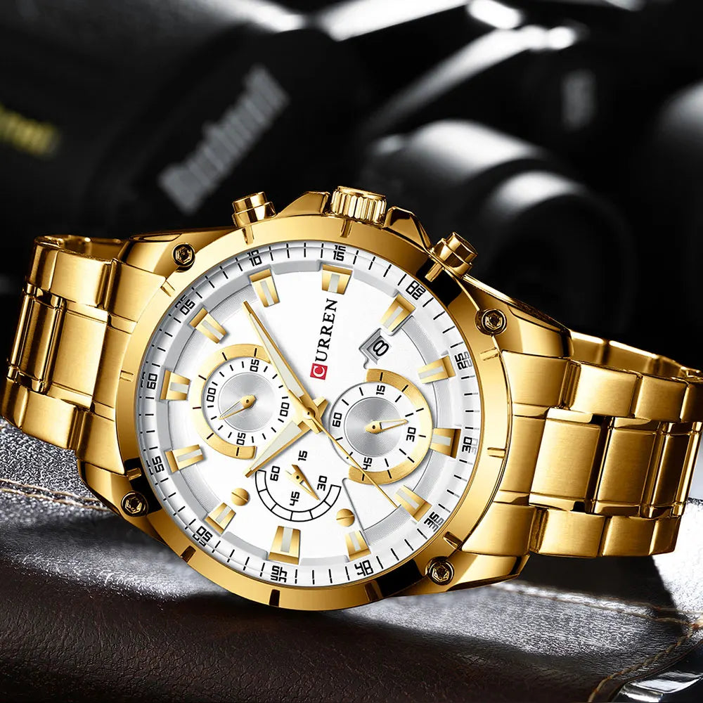 Men's luxury gold stainless steel watch with a white dial, chronograph sub-dials, and a date display.