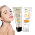 Two 40g tubes of SPF 50 and SPF 90 anti-oxidant sunscreen foundation next to a woman’s face.